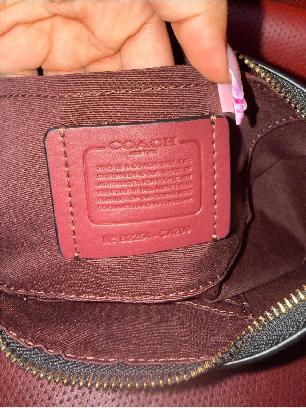 Coach Black Pebbled Leather Shoulder Bag with Gold Chain Accents